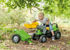 Immagine di Rolly Toys Trattore Rollykid Con Ruspa E Rimorchio